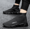 New high top breathable foot pedal men's and women's same couple shoes high bounce flying woven casual shoes